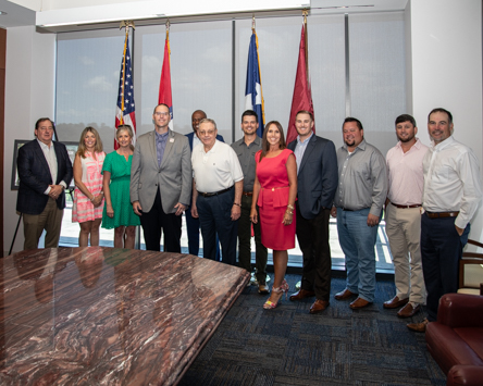 A group of local State Farm agents came together to sign partnership agreements with Texas A&M University-Texarkana. The agreements allow full time State Farm employees to receive tuition discounts at the university.