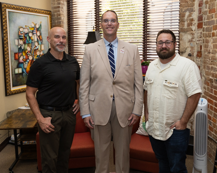 Photo (from left) Randy Thomason, Dr. Ross Alexander, and Billy Eldridge stand for a photo after signing the partnership agreement between Olive Tree Counseling and Texas A&M University-Texarkana.